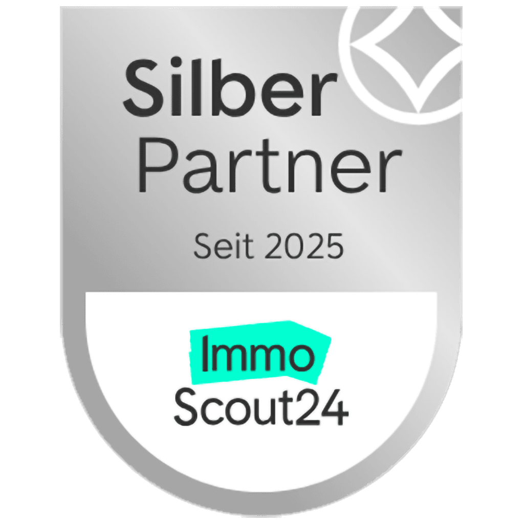 a silver and black badge